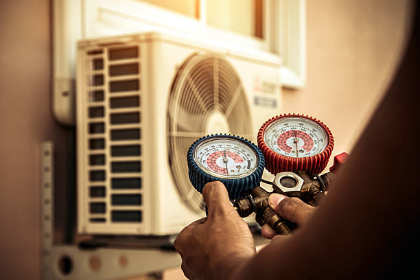 Professional Hvac technician working in Moravian Falls, NC